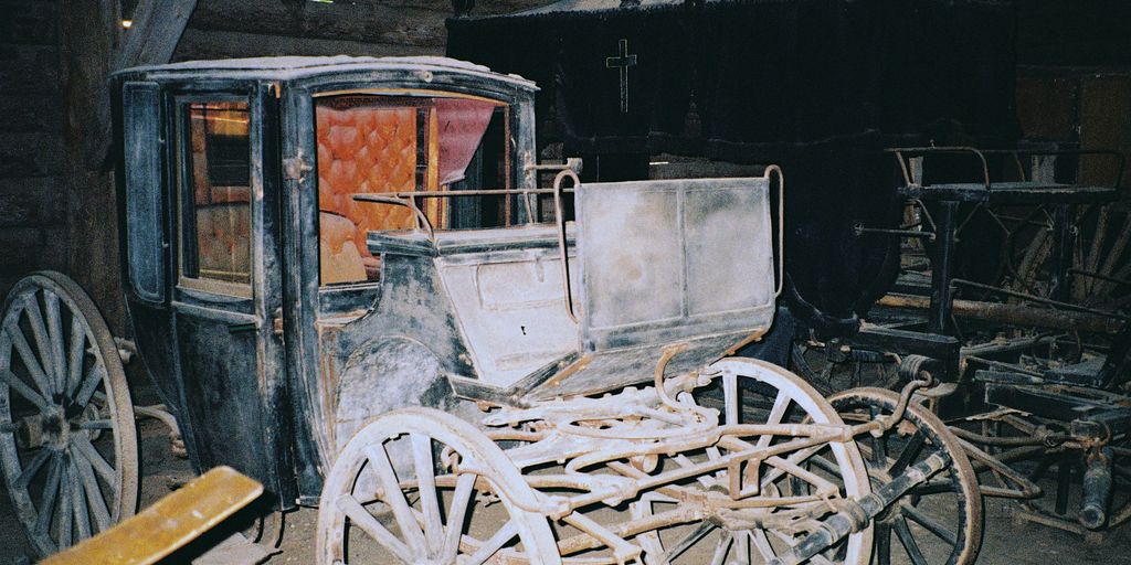 a carriage in a barn